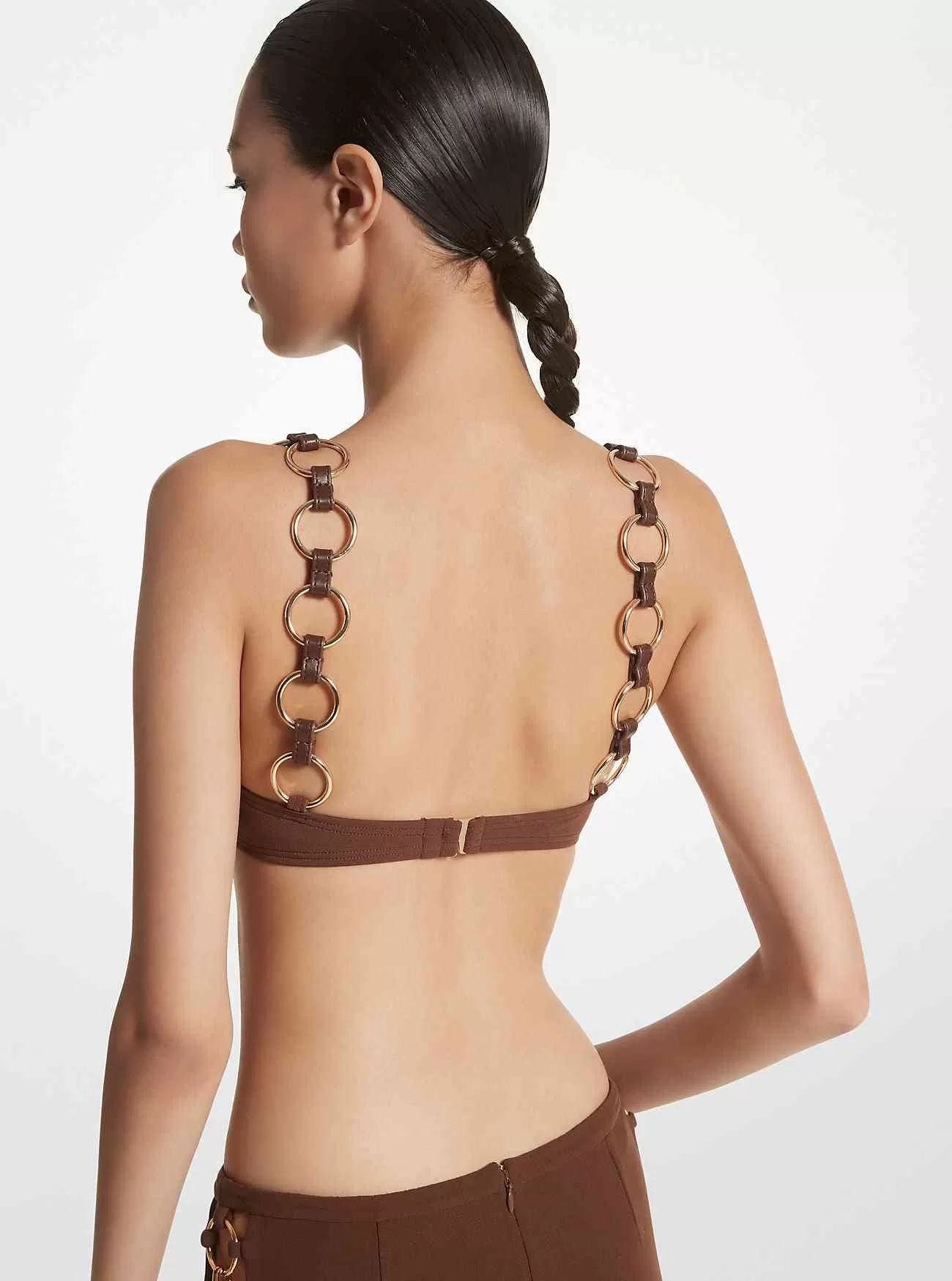 Top bikini in nylon elasticizzato decorato con anelli