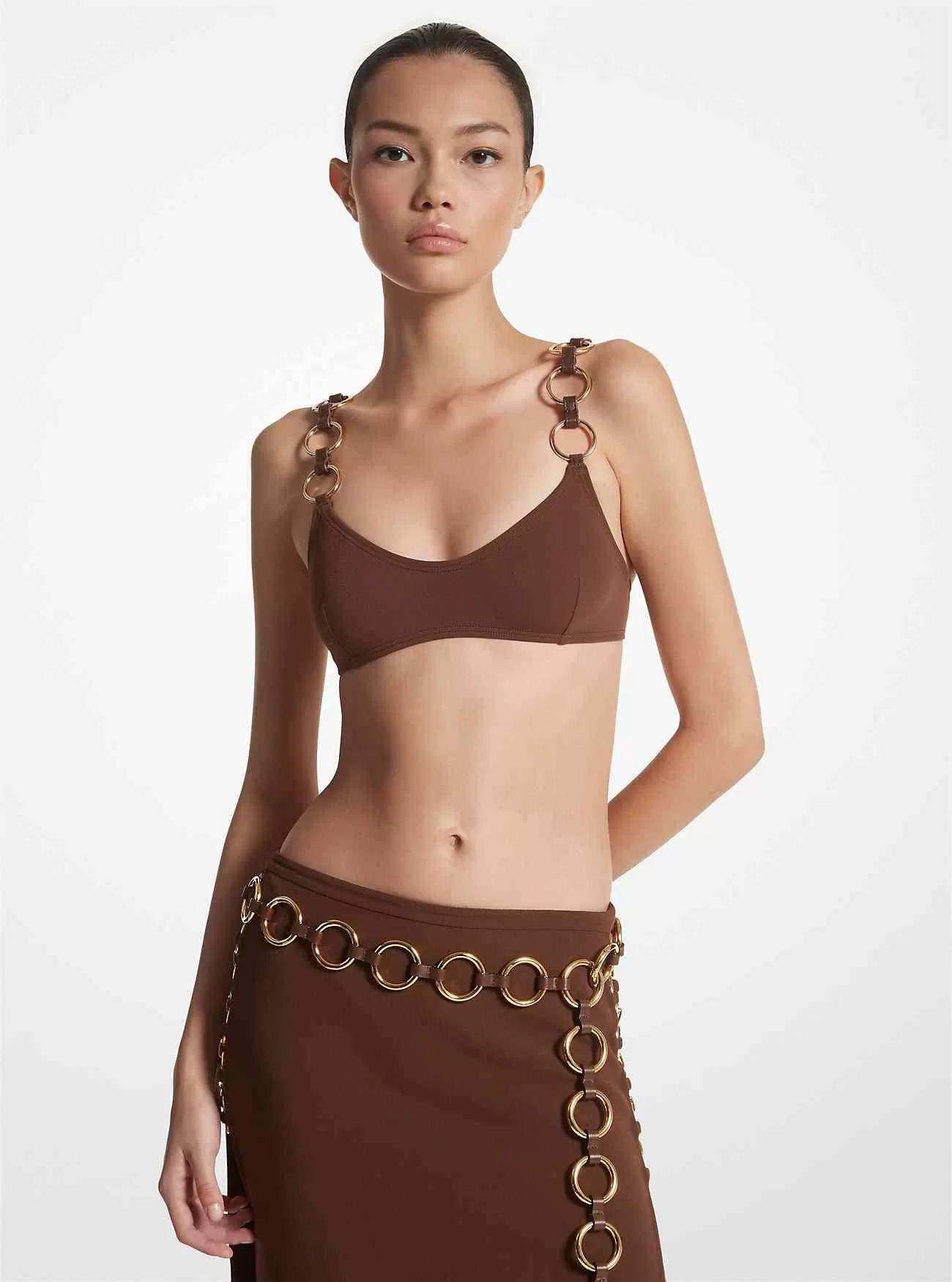 Top bikini in nylon elasticizzato decorato con anelli