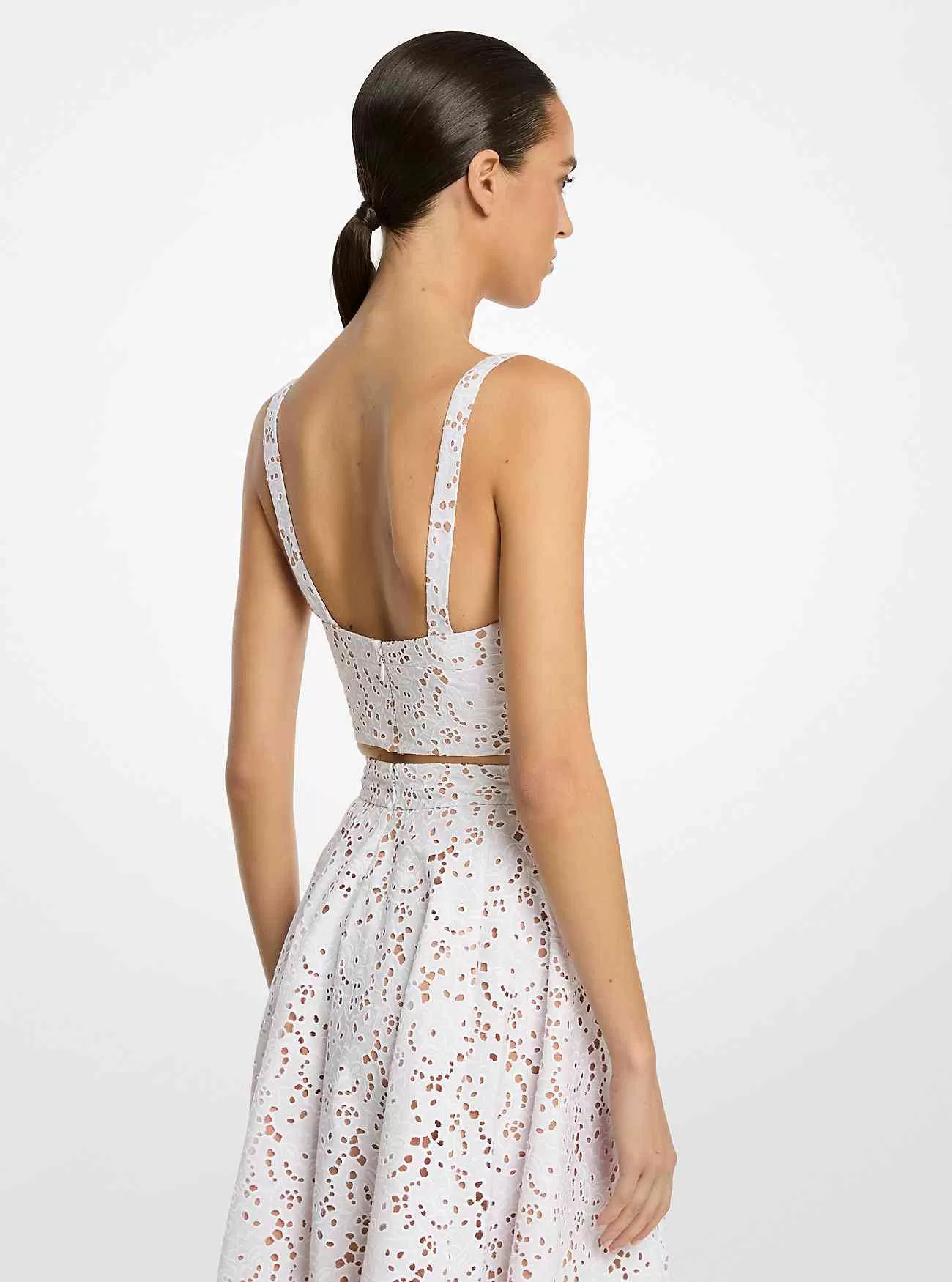 Top bustier con occhielli in cotone floreale