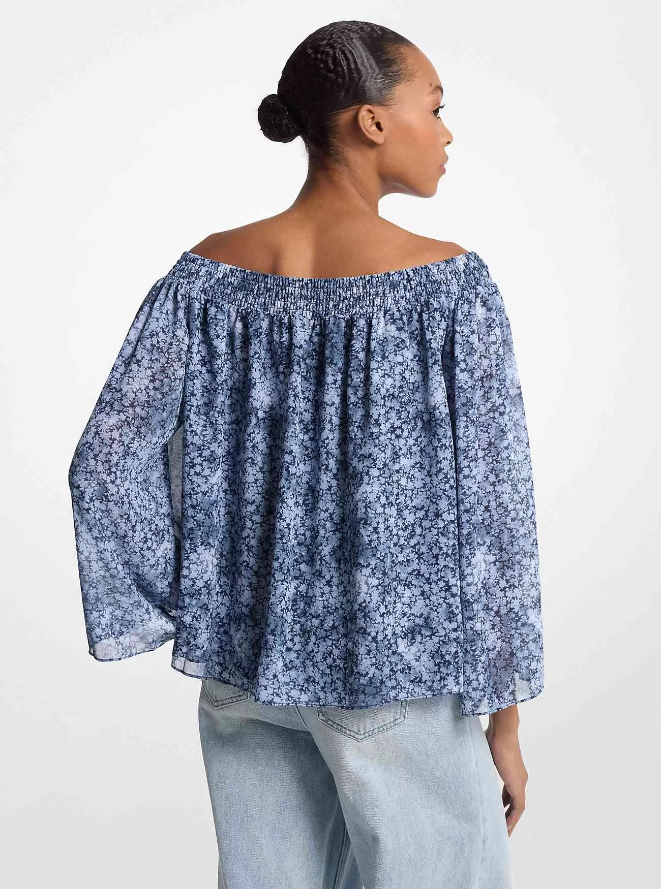 Top con spalle scoperte in georgette floreale tie-dye