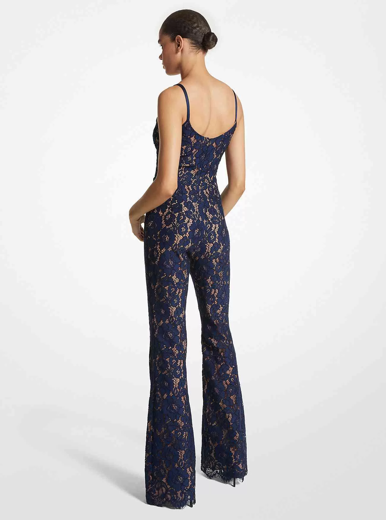 Tuta in pizzo floreale